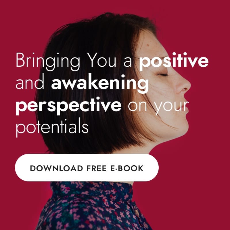 Profile of a person against a burgundy background with the text: Bringing you a positive and awakening perspective on your potentials. Below is a button labeled Download Free E-Book.